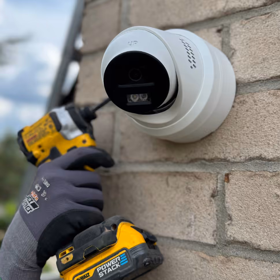 Security camera wiring being installed at a Mississauga property